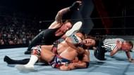 The Undertaker interrupting The Rock's pinfall